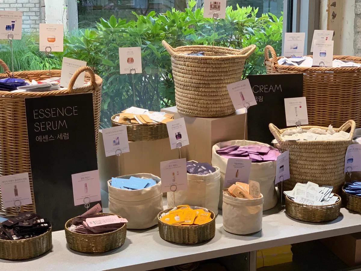 Amore Seongsu flagship store exterior concrete facade with garden