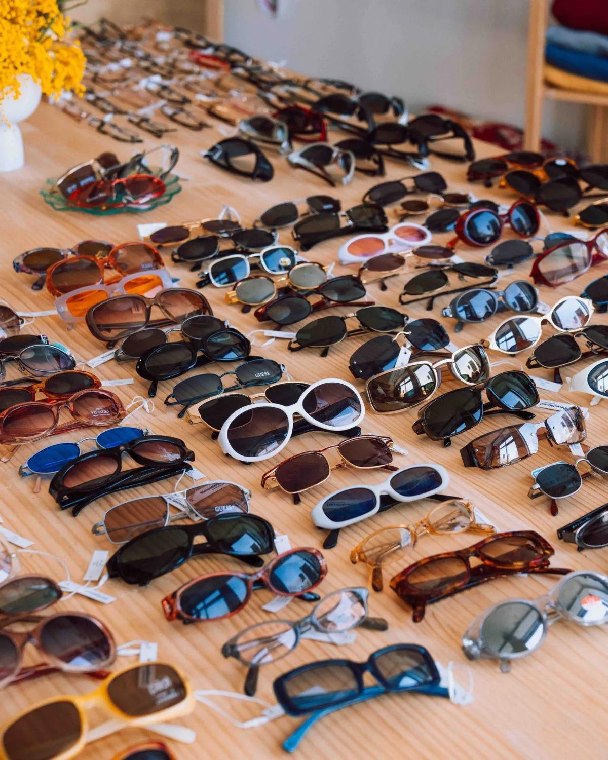 Bluewear vintage shop interior with organized clothing racks in Seongsu